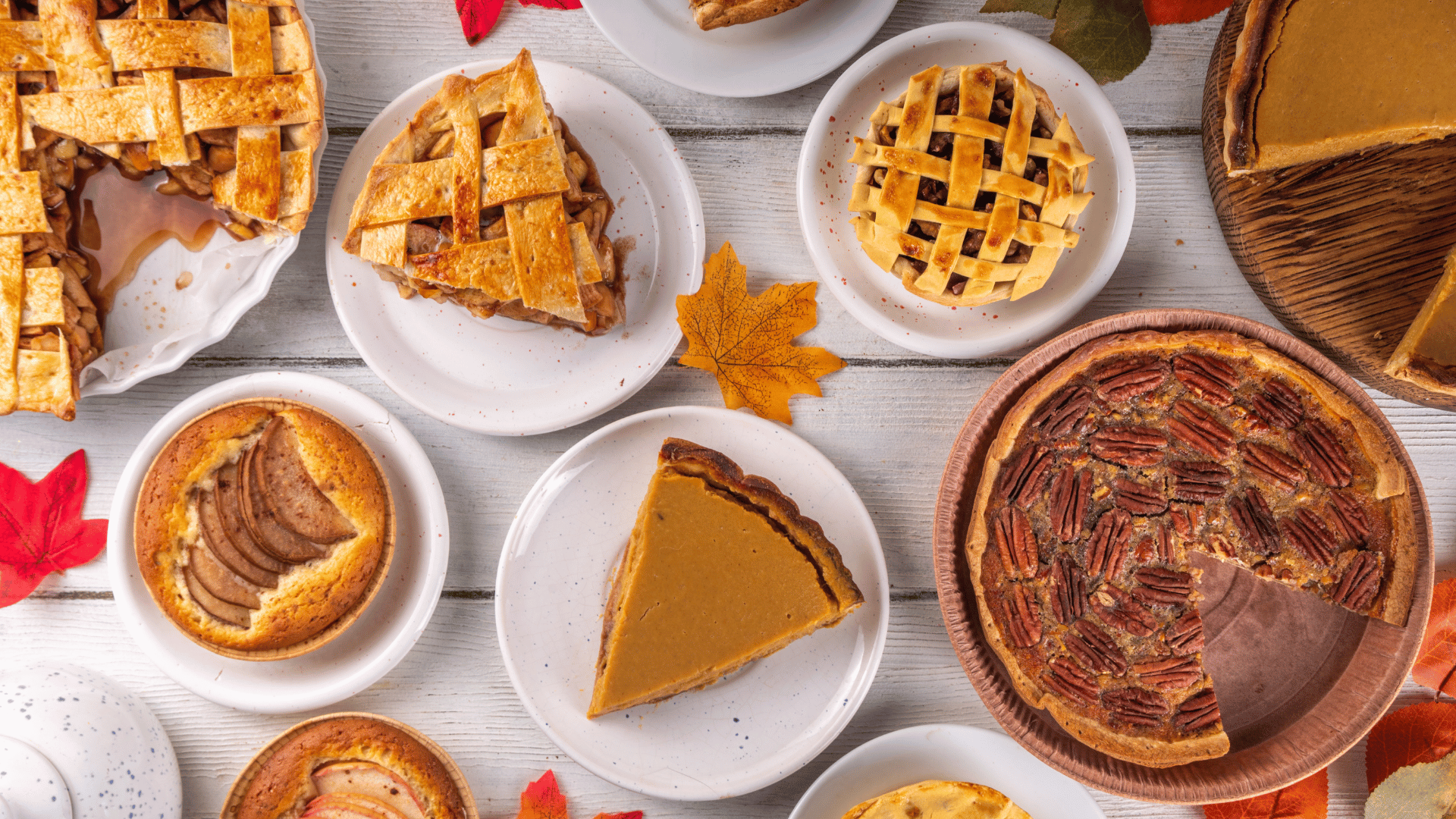 Table filled with cozy fall recipes like soup, pie, and cookies preserved on Recipe Memory