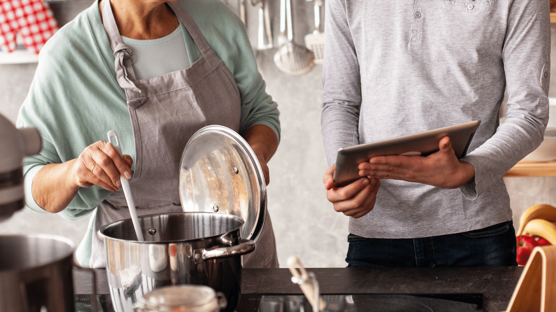Family gathered around a table sharing recipes on Recipe Memory