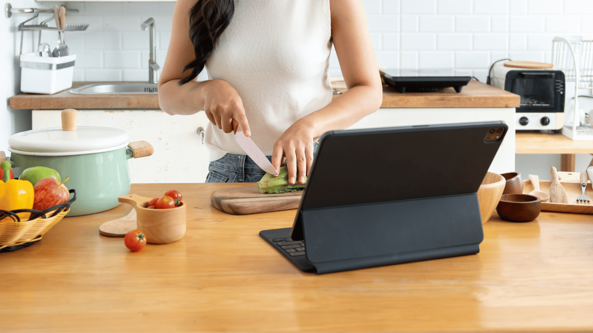 Hands hovering over a publish button with a family recipe card safely saved in Recipe Memory
