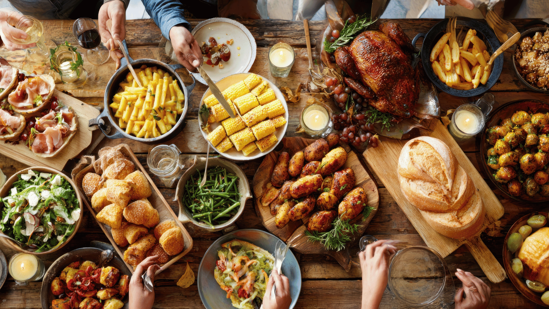 Thanksgiving table filled with turkey, stuffing, pies, and heirloom recipes preserved with Recipe Memory